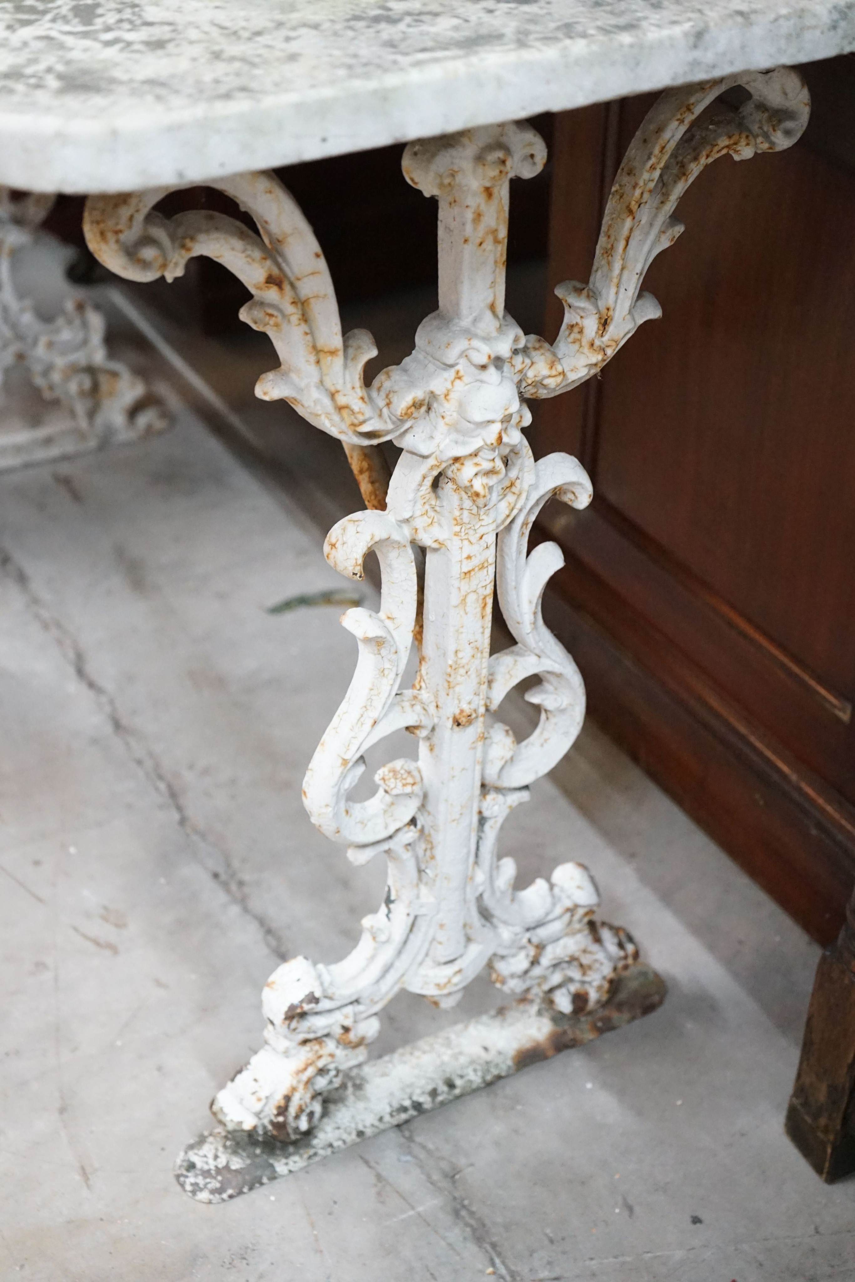 A Victorian rectangular cast iron marble top garden table, width 107cm, depth 53cm, height 72cm